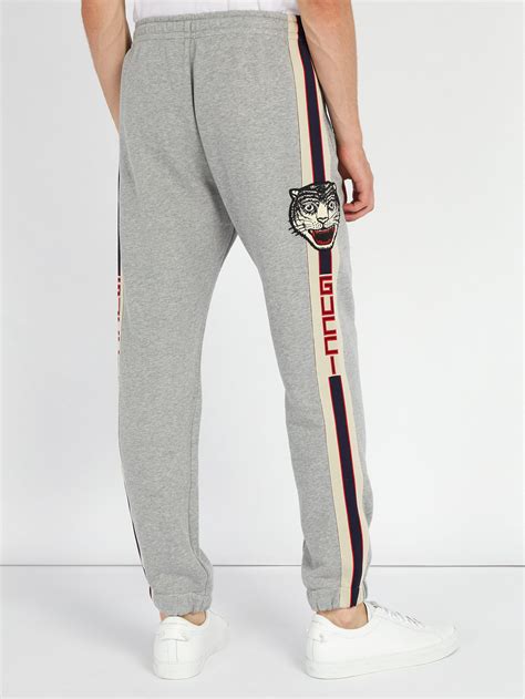 gucci tiger track pants|gucci jogging pants.